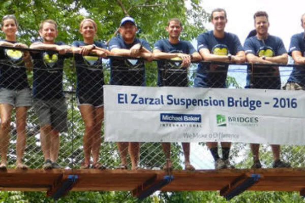 Michael Baker International contributes team and resources to build suspension bridge with Bridges to Prosperity