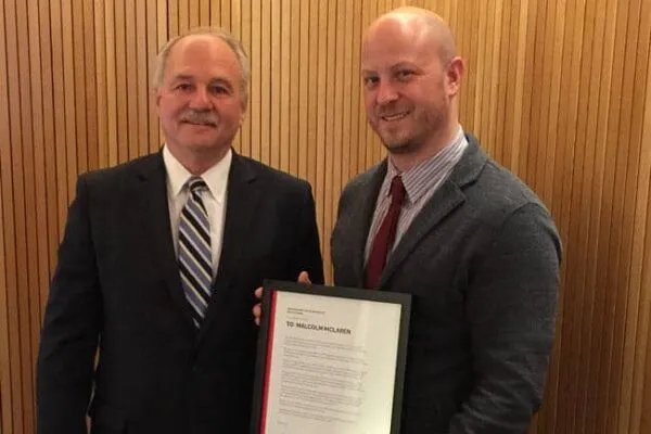 CEO and president of McLaren Engineering Group, Malcolm G. McLaren (left), was presented with a proclamation from AIA NY executive directer Benjamin Prosky. Photo: McLaren Engineering Group | McLaren Engineering Group celebrates 40 years of applied ingenuity