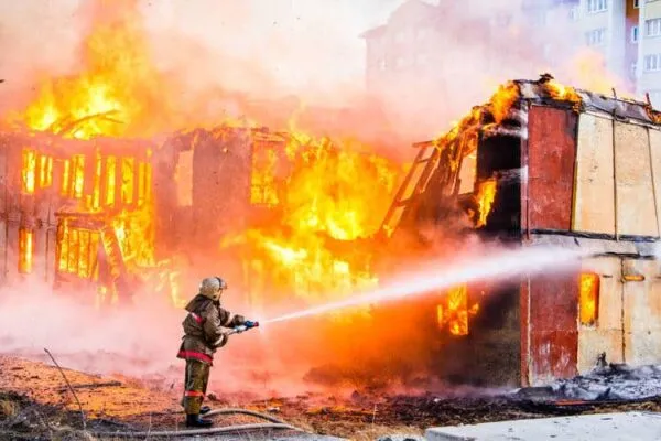 Three-alarm fire destroys wood-framed apartment building under construction