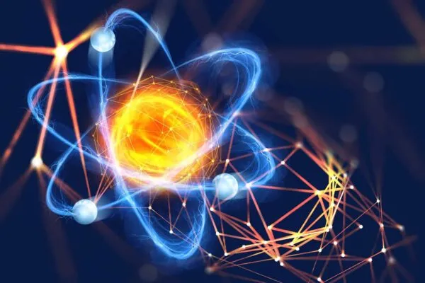 Atomic structure. Futuristic concept on the topic of nanotechnology in science. The nucleus of an atom surrounded by electrons on a technological background | Electron-behaving nanoparticles rock current understanding of matter