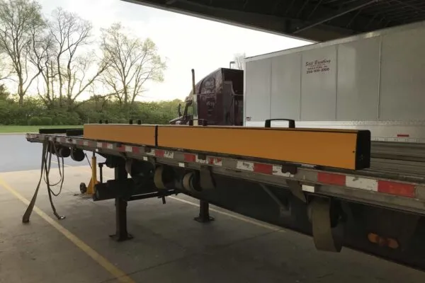 TrailerKerb provides a ‘kerb’ to make it safer to operate forklifts on flatbed trailers at loading docks. | A-Safe Launches TrailerKerb for Loading Flatbeds at the Dock