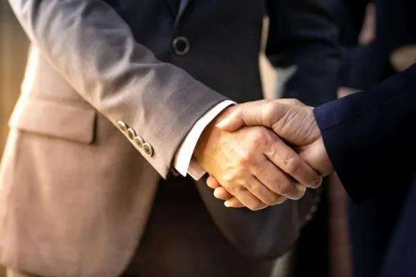 Handshake for Business deal Business Mergers and acquisitions Closeup | McLaren Engineering Group Hires New Civil Division Principal in Baltimore