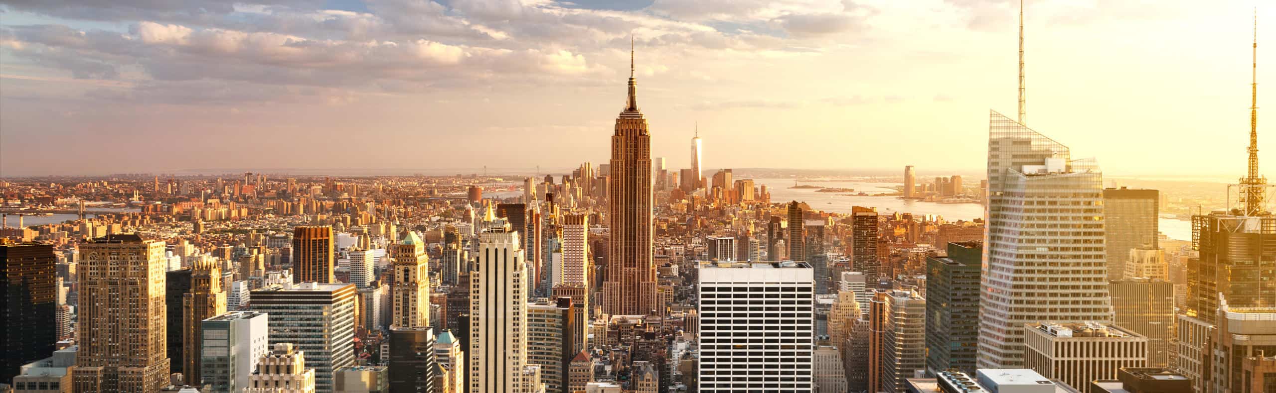 New York City skyline with urban skyscrapers at sunset, USA. | Plan Sheets + Red Lines – October 2019