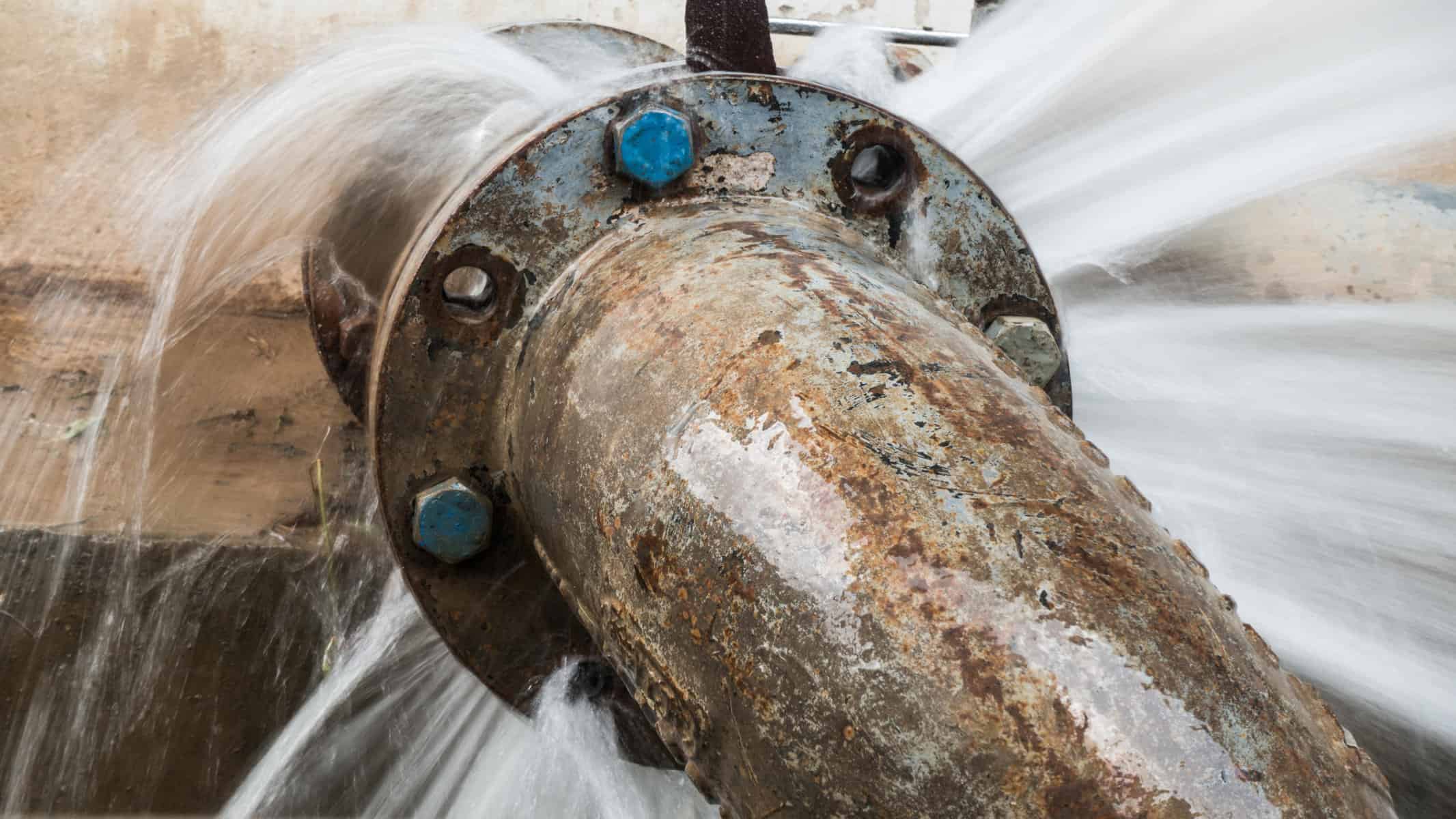 metal pipe with valve is leaking in water treatment plant | Keeping the Water On