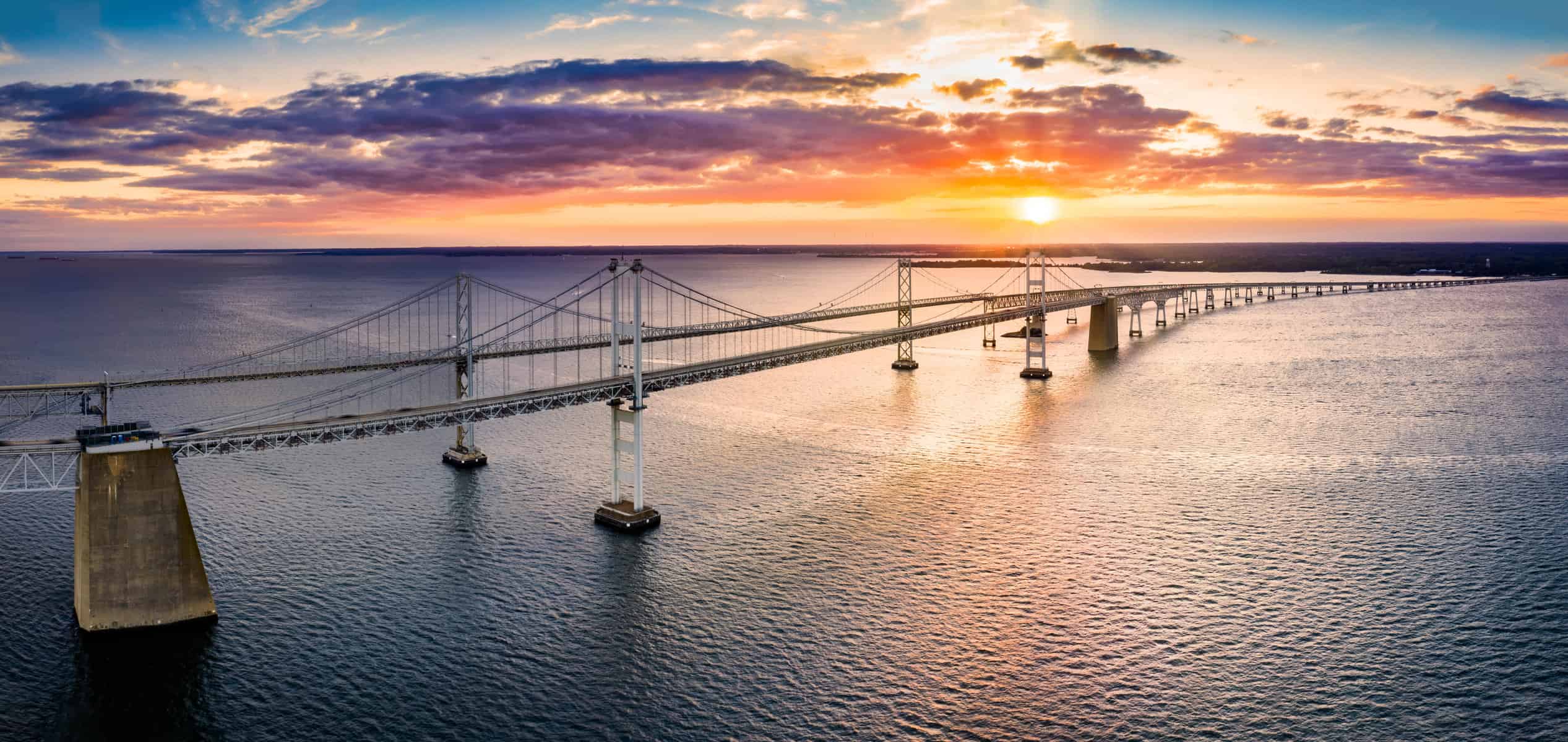 Aerial view of Chesapeake Bay Bridge at sunset. Civil + Structural