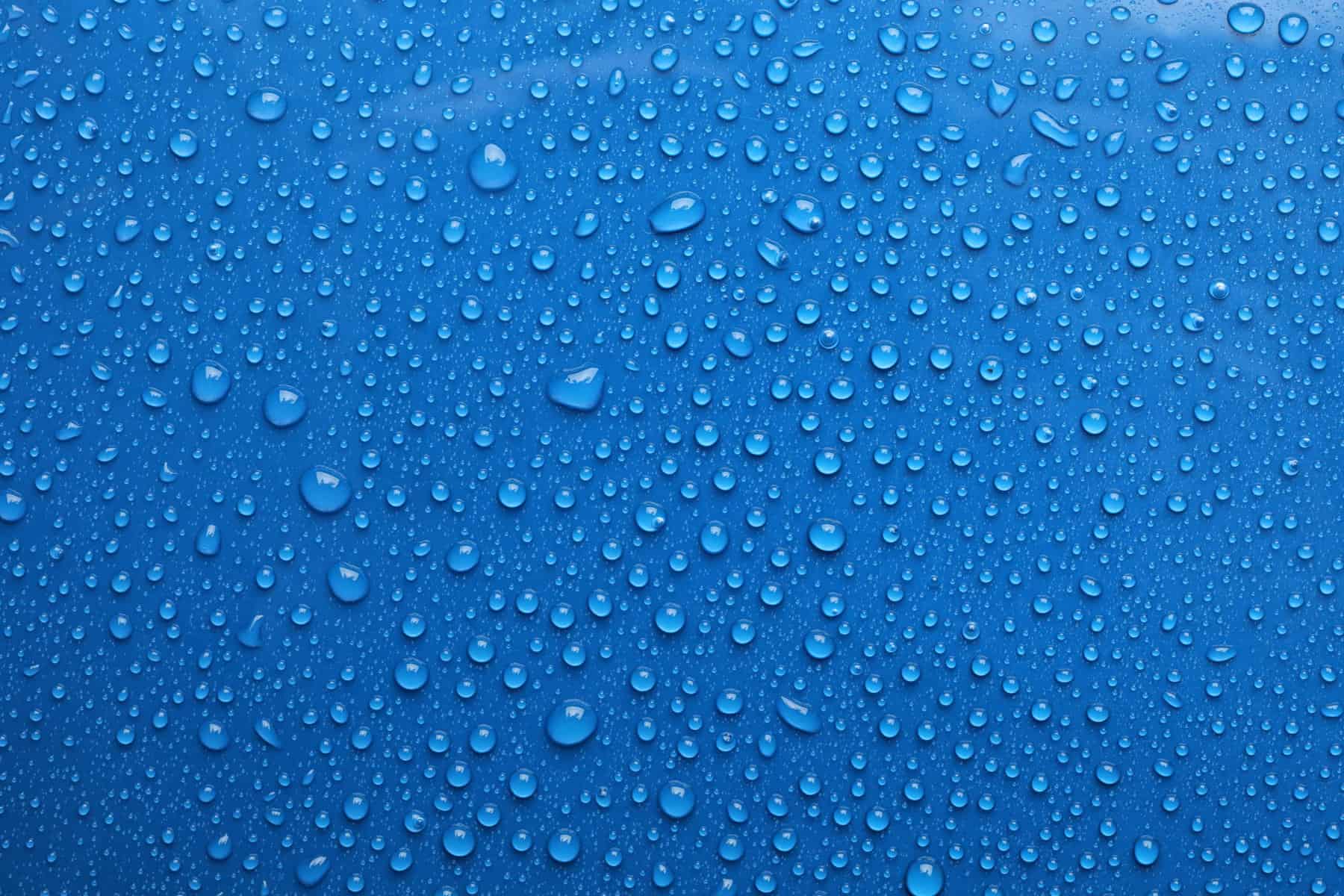 Water Drops On Blue Background Top View Civil Structural Engineer Magazine