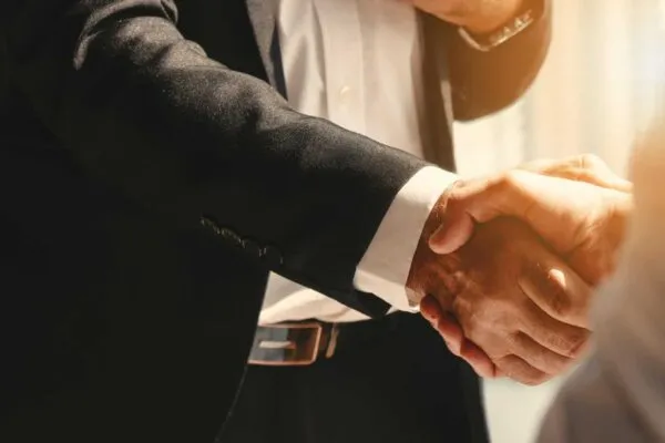 business background of businessman having handshake | Rhino Doors to support Australian infrastructure and engineering projects with new partnership agreement