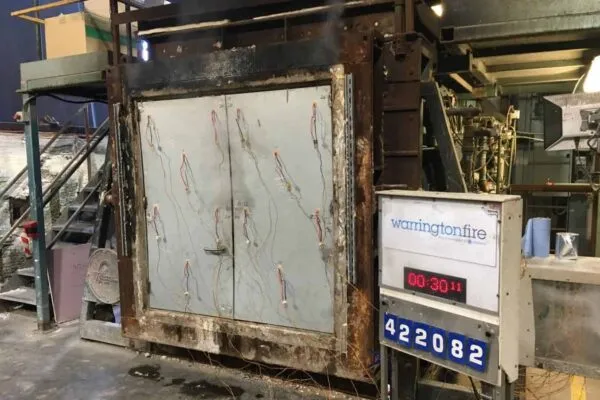 Pictured: Rhino Door’s new insulated fire door following initial fire tests carried out at WarringtonFire | Call for Rail Projects to Use More Effective Fire Doors