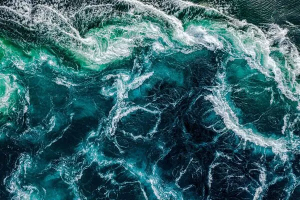 Abstract background. Waves of water of the river and the sea meet each other during high tide and low tide. Whirlpools of the maelstrom of Saltstraumen, Nordland, Norway | Water, Life’s Precious Resource