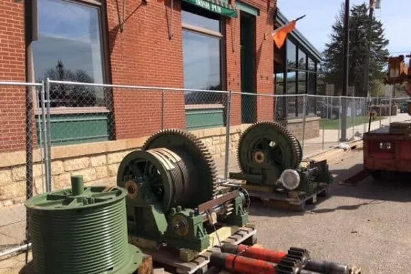 New drums with ring and pinion gears await installation on the lift span of the Stillwater Lift Bridge. | Repairs resume on Stillwater Lift Bridge
