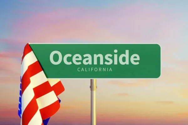 Oceanside – California. Road or Town Sign. Flag of the united states. Sunset oder Sunrise Sky | CITY OF OCEANSIDE CELEBRATES WATER AWARENESS MONTH  WITH ITS NEW VIRTUAL REALITY WATER VIDEO
