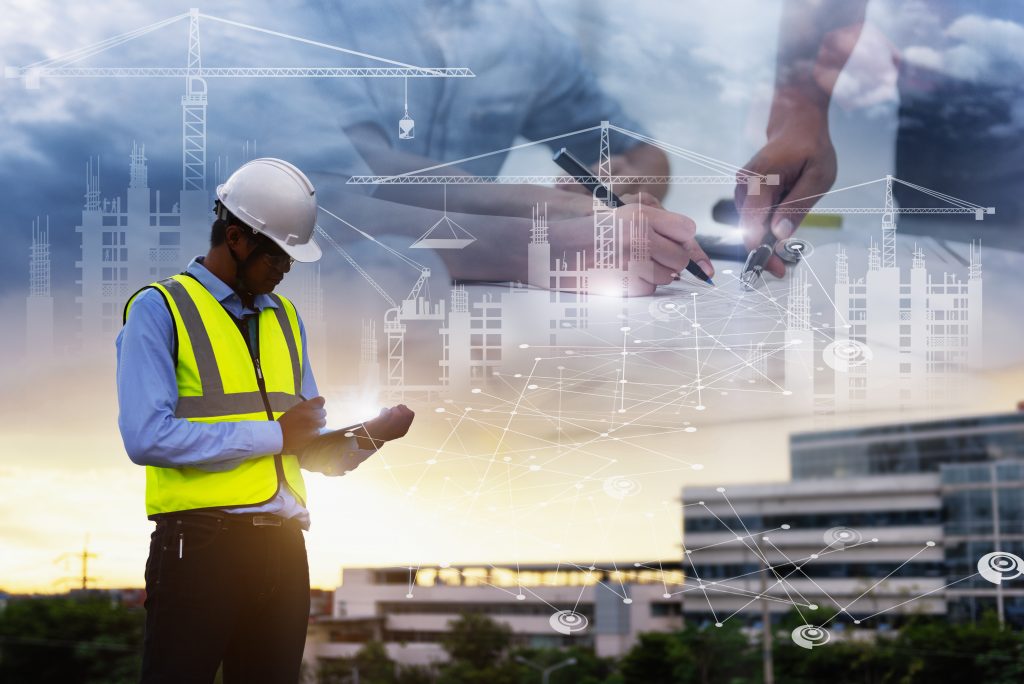 Engineering Consulting People On Construction Site Holding Tablet In