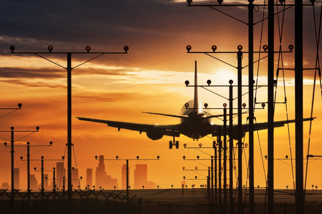 Plane Landing In LAX Airport At Sunset. Los Angeles, California | Civil ...