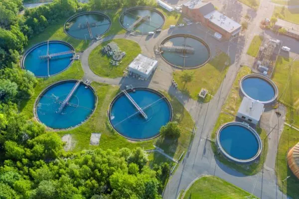 Aerial panoramic view of modern urban wastewater treatment plant water purification is the process of removing undesirable chemicals | Orolia Defense & Security Delivers M-Code Enabled Timing & Sync to Lockheed Martin