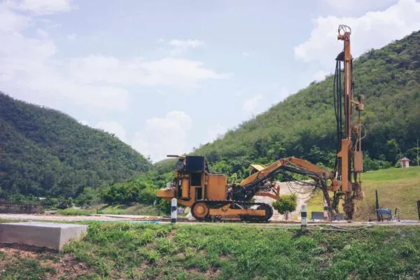 Ground water hole drilling machine. selective focus | Universal Engineering Sciences Announces Agreement for Long-Term Strategic Partnership with BDT Capital Partners