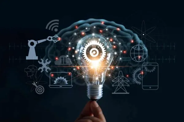 Hand holding light bulb and cog inside and innovation icon network connection on brain background, innovative technology in science and industrial concept | Trimble Launches $200 Million Venture Fund