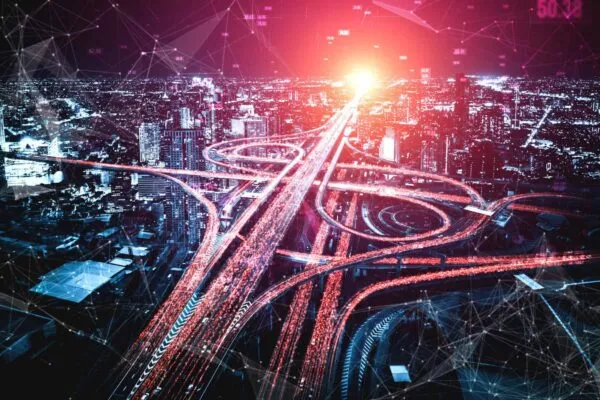 Futuristic road transportation technology with digital data transfer graphic showing concept of traffic big data analytic and internet of things . | Balfour Beatty and Stantec selected by Jacksonville Transportation Authority to expand downtown transit with AV technology