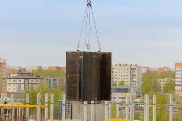 May 15, 2017: Builders work on monolithic works at the construction site of a multi-storey building. Cheboksary. Russia. | Modular Construction Market is expected to reach USD 141.80 billion by 2027