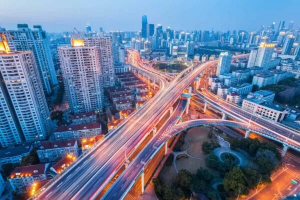 city interchange at nightfall in shanghai, modern transport infrastructure background | CSII Celebrates Unprecedented Investment to Modernize Nation’s Infrastructure