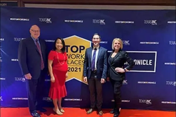 LAN team at Houston Chronicle’s 2021 Top Workplaces event. From left to right: President Wayne Swafford, engineer Robin Li, flood mitigation manager Tak Makino and Vice President Amy Abdallah      | Houston Chronicle Names LAN as a 2021 Top Workplace