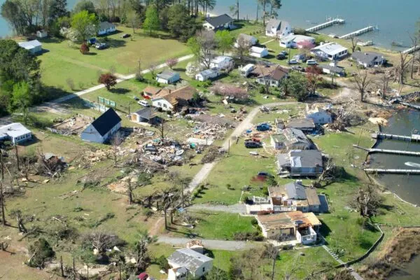 Buildings were severely damaged by a tornado that ripped through Deltaville, VA on Saturday, April 16, 2011. This aerial was shot on Sunday, April 17, 2011. Tornadoes and flash flooding have left at least six people dead in Virginia and crews are continuing to assess damage that severe weekend storms caused across several areas of the state. (Randall Greenwell/The Virginian-Pilot) | Simpson Strong-Tie Aids Recovery from Recent Tornadoes with $15,000 Donation to Red Cross Disaster Relief Fund