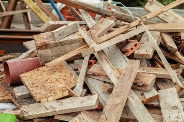 Construction waste on the roof of the house under construction. Outdoors | Free trial of AI-powered structural timber design software reduces construction waste by up to 80%