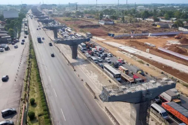West Java, Indonesia - October 10, 2018: Construction site of Jakarta-Cikampek elevated toll road project with traffic jam on the highway | BRIDGEFARMER WELCOMES THE NEW YEAR CELEBRATING 45 YEARS AND ANNOUNCES THE PROMOTION OF BRIAN WRIGHT, PE AND STEPHEN SMILEY, PE