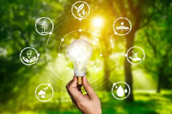 Green energy innovation light bulb with future industry of power generation icon graphic interface. Concept of sustainability development by alternative energy. | CETY Secures $825,000 Sales Order for WHP (Waste Heat to Power) with Greenverse Energy Group