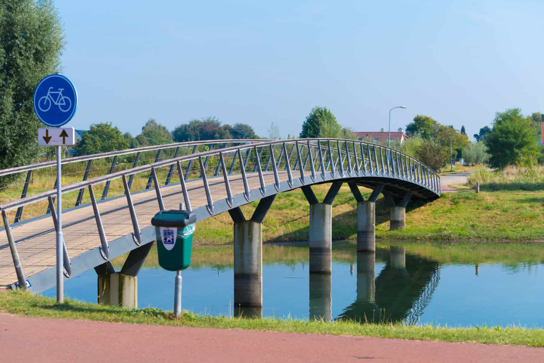 small bicycle bridge over a canal | UCSD, Kleinfelder Receive PCI Design Award for  UC San Diego Mesa Housing Pedestrian and Bicycle Bridge