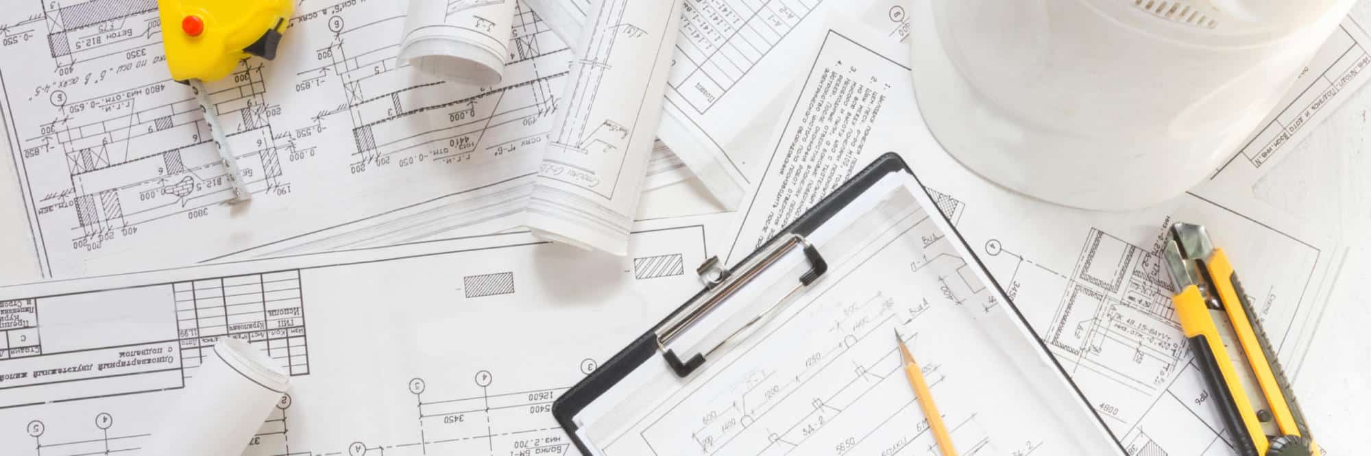 architect design working drawing sketch plans blueprints and making architectural construction model in architect studio,flat lay | Superior Construction Welcomes Burns Logan as General Counsel