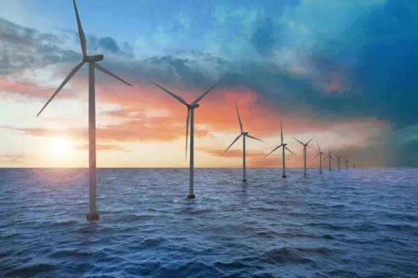 Floating wind turbines installed in sea. Alternative energy source | COWI inks engineering contract with Equinor for Empire Wind project