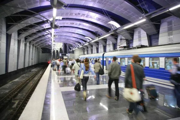 People and a train at metro station | METRO STATION LIGHTING PROJECT CITED IN NATIONAL ENGINEERING COMPETITION