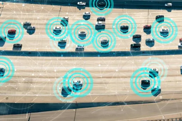 Autonomous vehicles driving and communicating on the highway | How The U.S. Will Deploy Intelligent Transit Networks That Enable Connected Vehicles
