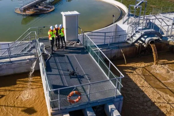 Engineers assesing waste water treatment plant with industrial drone | JMS Announces Succession Plan