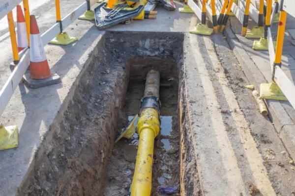 Underground pipe being fixed in trench | Landmark EPC Adopts ProStar’s PointMan Solution to Digitally Map Critical Underground Infrastructure of Boulder, Colorado