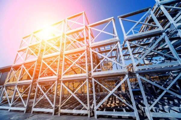 Structure of steel. Building construction on sky background. Texture | Nine Projects Win Steel Industry’s Highest Design Honor