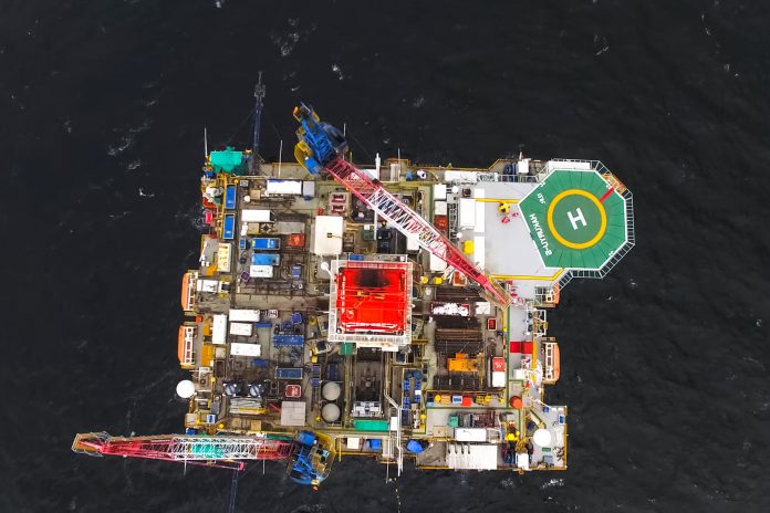 Oil offshore platform in the sea. Extraction of oil on the shelf