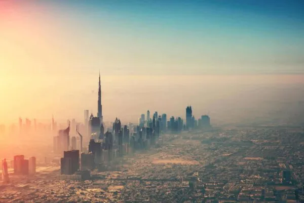 Aerial view of Dubai city in sunset light. Panoramic view. Dubai is the biggest and most modern city in UAE. | Facilities Management in the Middle East