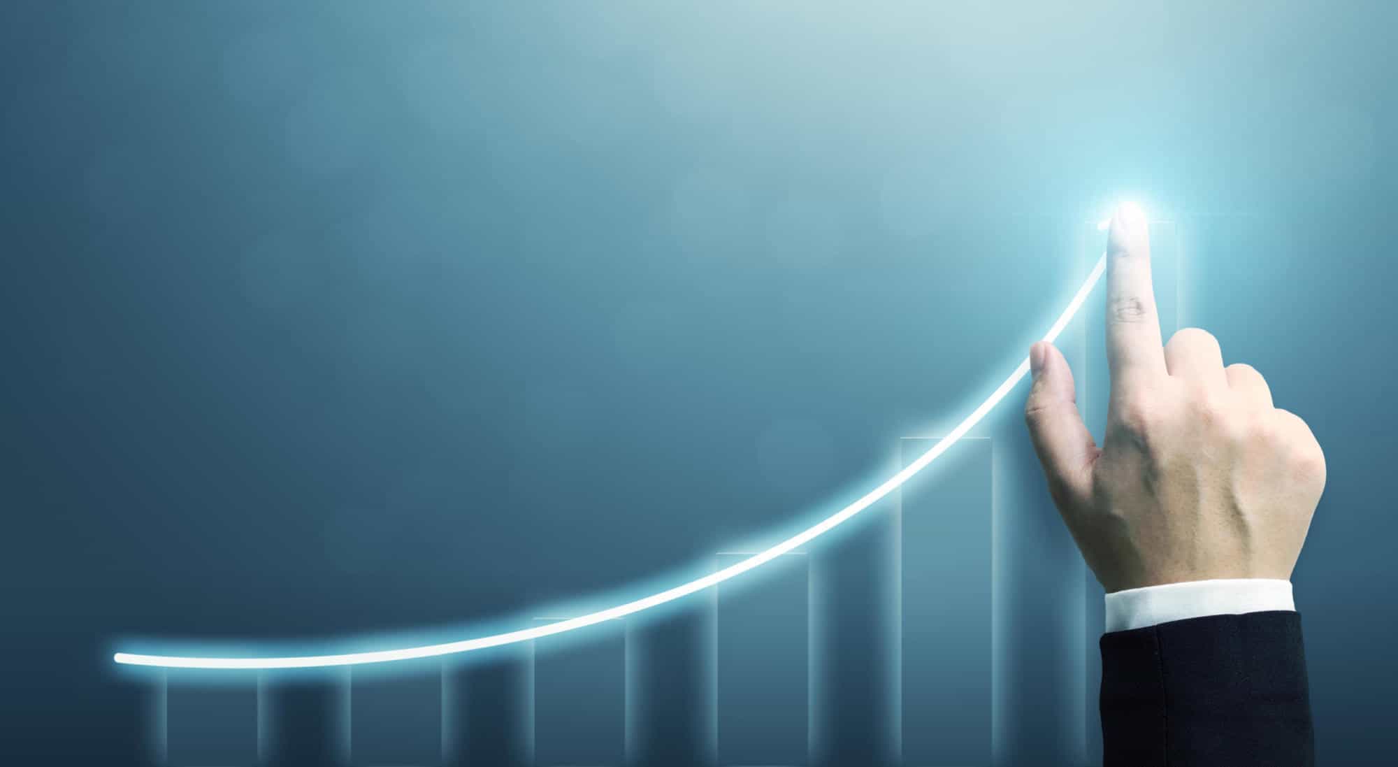 Business development to success and growing growth concept, Businessman pointing arrow graph corporate future growth plan | How to Make 2023 Your Most Profitable Year Yet
