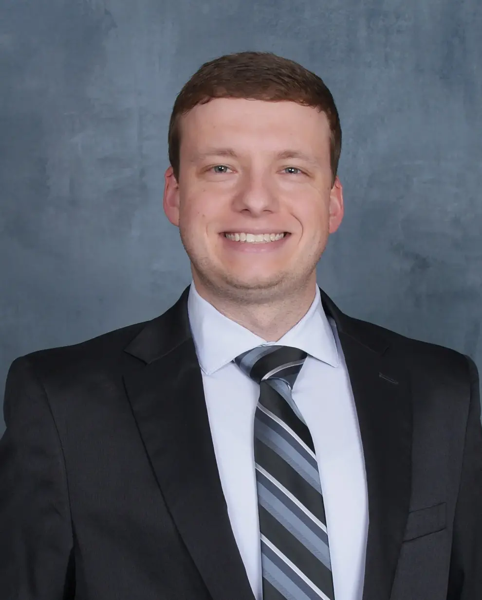 TAYLOR D. HARTMAN RECEIVES PROFESSIONAL ENGINEERING LICENSE
