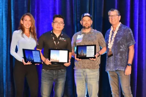 Third from left, Western Assistant Branch Manager Aaron Williams receives award on behalf of Western at SWR Institute Winter Technical Meeting. | Western Specialty Contractors Wins National SWR Institute Trinity Project Award for Broward Financial Centre Façade Sealant Repairs