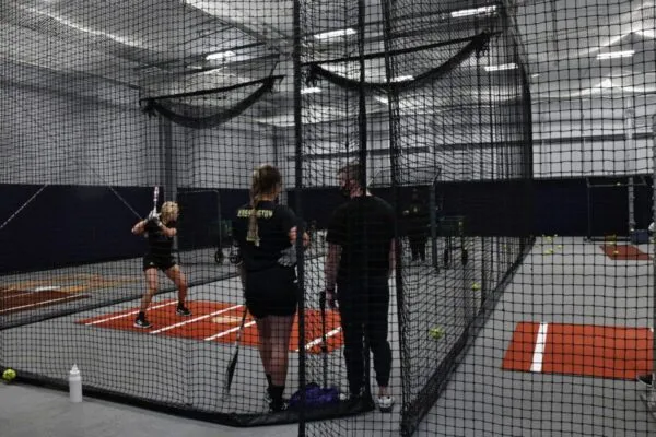 University of Washington Softball Performance Center batting and pitching area | Sports Training Facilities: Creating Successful Environments Focused on High Performance and Athlete Wellbeing 