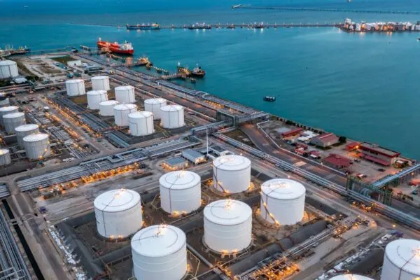 Aerial view oil terminal industrial facility storage tank oil and petrochemical product for transport to further storage facility, Storage tank petroleum petrochemical refinery product at oil terminal | Solving the False Dilemma of Seawater