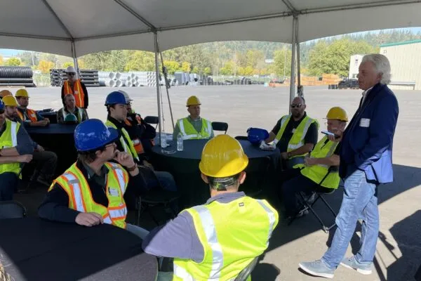 Lane President and CEO Patrick X. Collings addresses the group during the open house tour of the company’s new Pacific Coast pipe plant that also serves as a stocking distribution yard. | LANE OPENS NORTHWEST PIPE PLANT AND DISTRIBUTION YARD