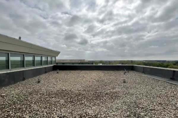 Project completed | Western Specialty Contractors Performs Roof Recovery on Millbrook Business Center in Buffalo Grove, IL