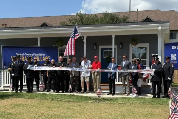 Ribbon-cutting Ceremony. Photo Credit: LAN. | Ribbon Cutting Celebrates Opening of Tunnel to Towers Smart Home Community for Veterans and First Responders 